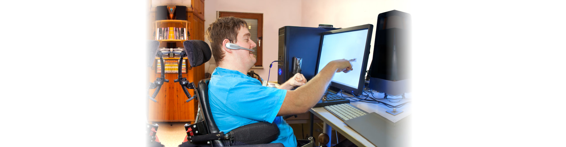 man with special needs using a computer